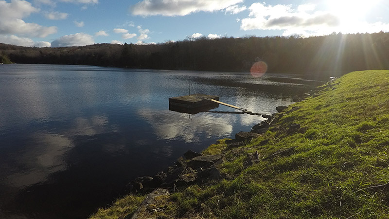 Landscape view of a dam in a lake.